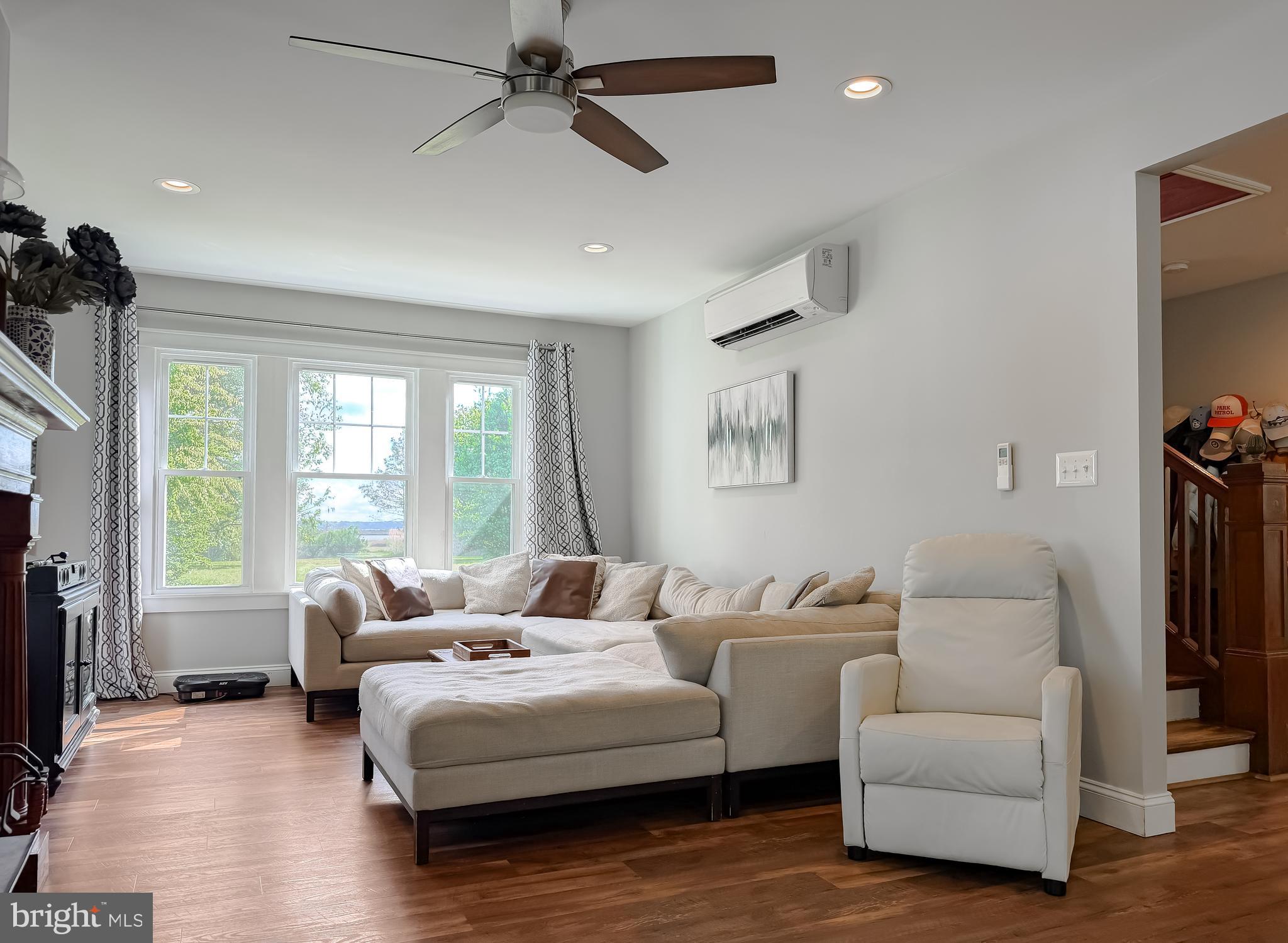 16146 Thomas Road Piney Point, MD 20674 - Photo 15 of 57 a living room with furniture and a large window