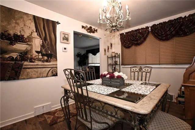 a table and chairs in a kitchen