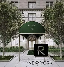 a kitchen with a stove a sink and a refrigerator