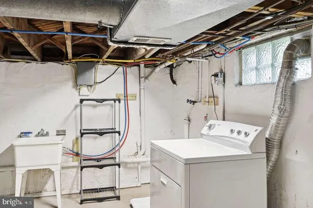 a picture of a bathroom with a sink