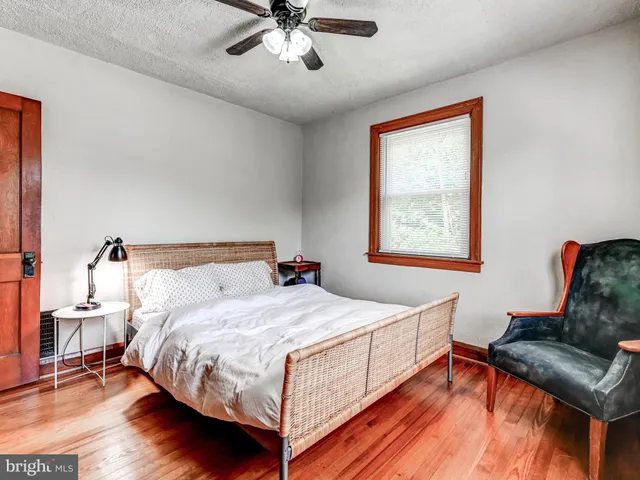 a kitchen with stainless steel appliances a stove top oven a sink and cabinets