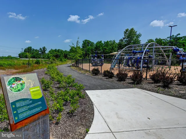 a view of outdoor space with swimming pool and furniture