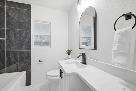 a view of a workspace with furniture