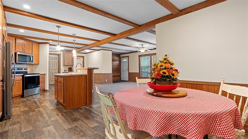 86 Eldersville Road Burgettstown, PA 15021 - Photo 15 of 50 a dining room with furniture and a fireplace
