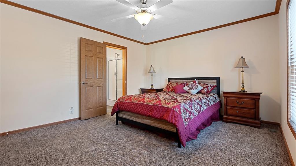86 Eldersville Road Burgettstown, PA 15021 - Photo 23 of 50 a bedroom with a bed and a chandelier