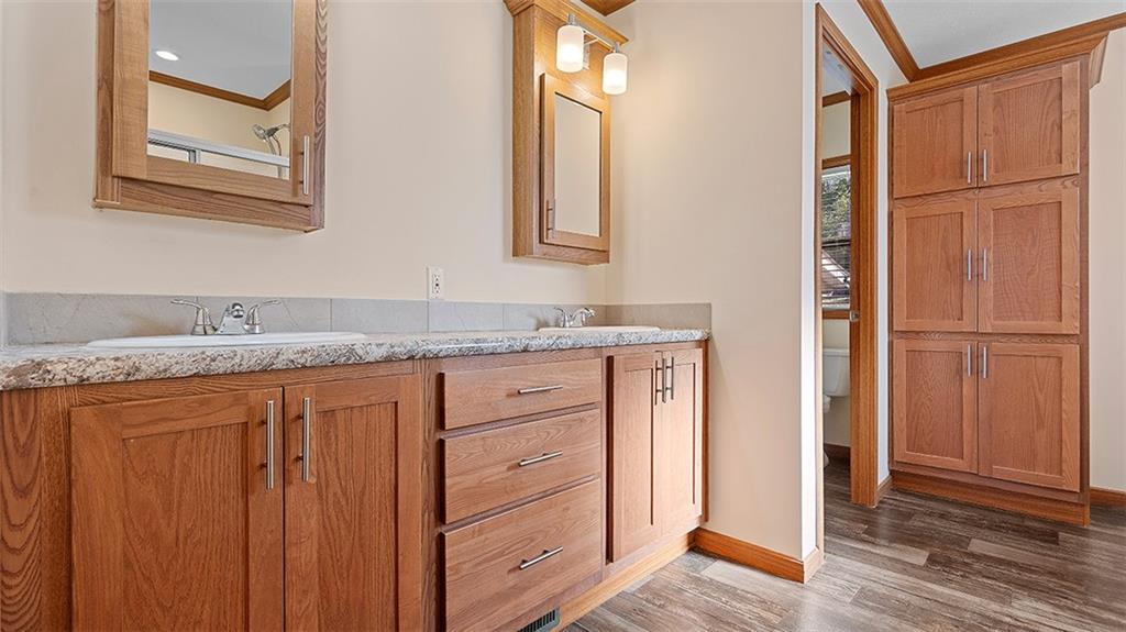86 Eldersville Road Burgettstown, PA 15021 - Photo 25 of 50 a bathroom with a granite countertop sink and a mirror