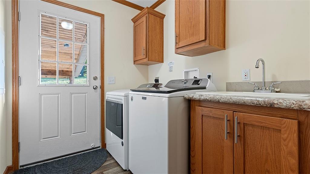 86 Eldersville Road Burgettstown, PA 15021 - Photo 34 of 50 a kitchen with stainless steel appliances granite countertop a sink and a window