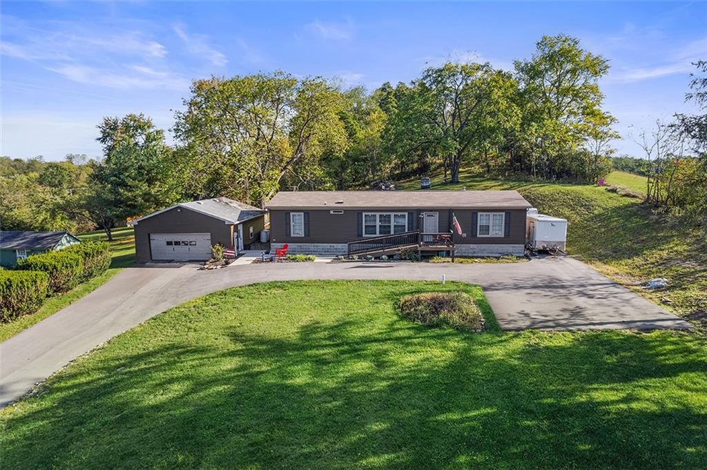 86 Eldersville Road Burgettstown, PA 15021 - Photo 41 of 50 a front view of house with yard and outdoor seating