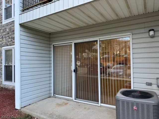 a view of a porch with furniture