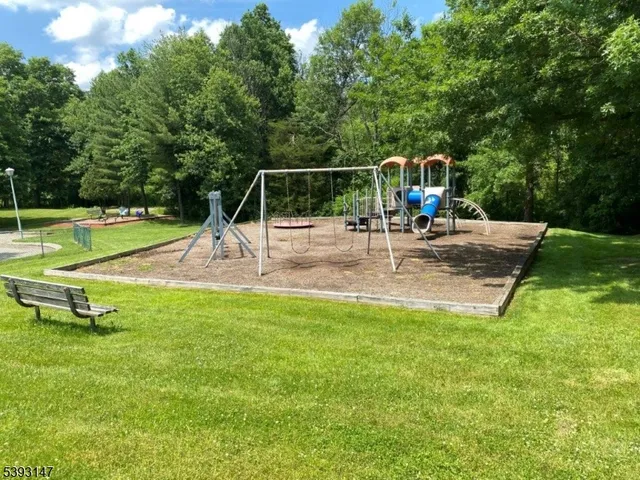 a view of a park with swings