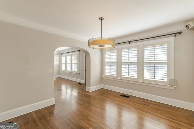 a kitchen with stainless steel appliances a sink and a stove