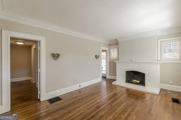 a view of a room with a large window