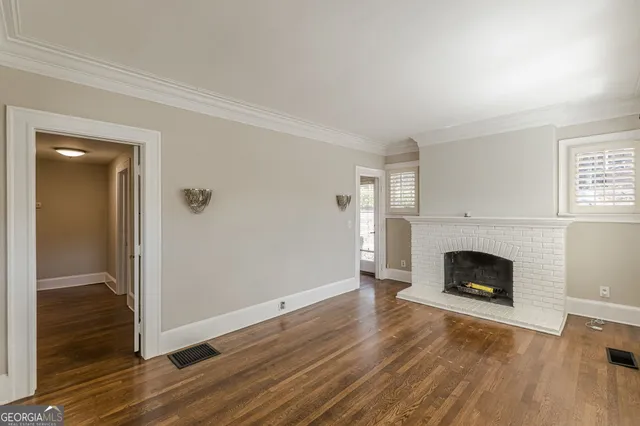 a view of a room with a large window