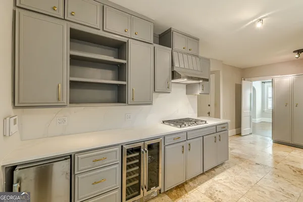 a view of a room with rack and cabinets