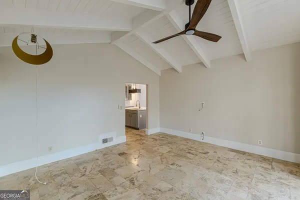 a view of livingroom with kitchen