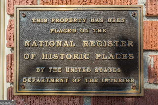 a view of road with yard and trees