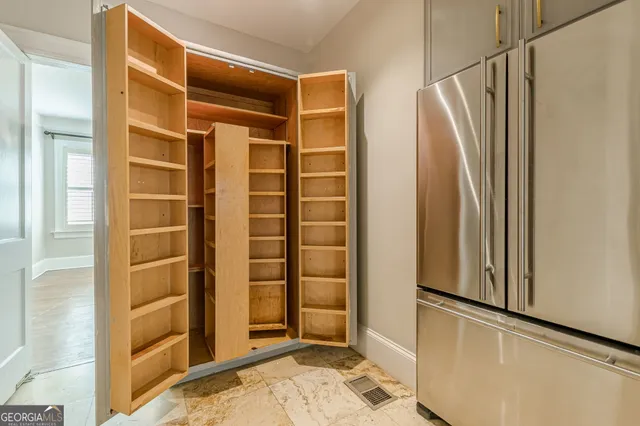 a room with furniture and a mirror