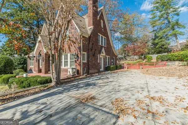 a view of a backyard of the house