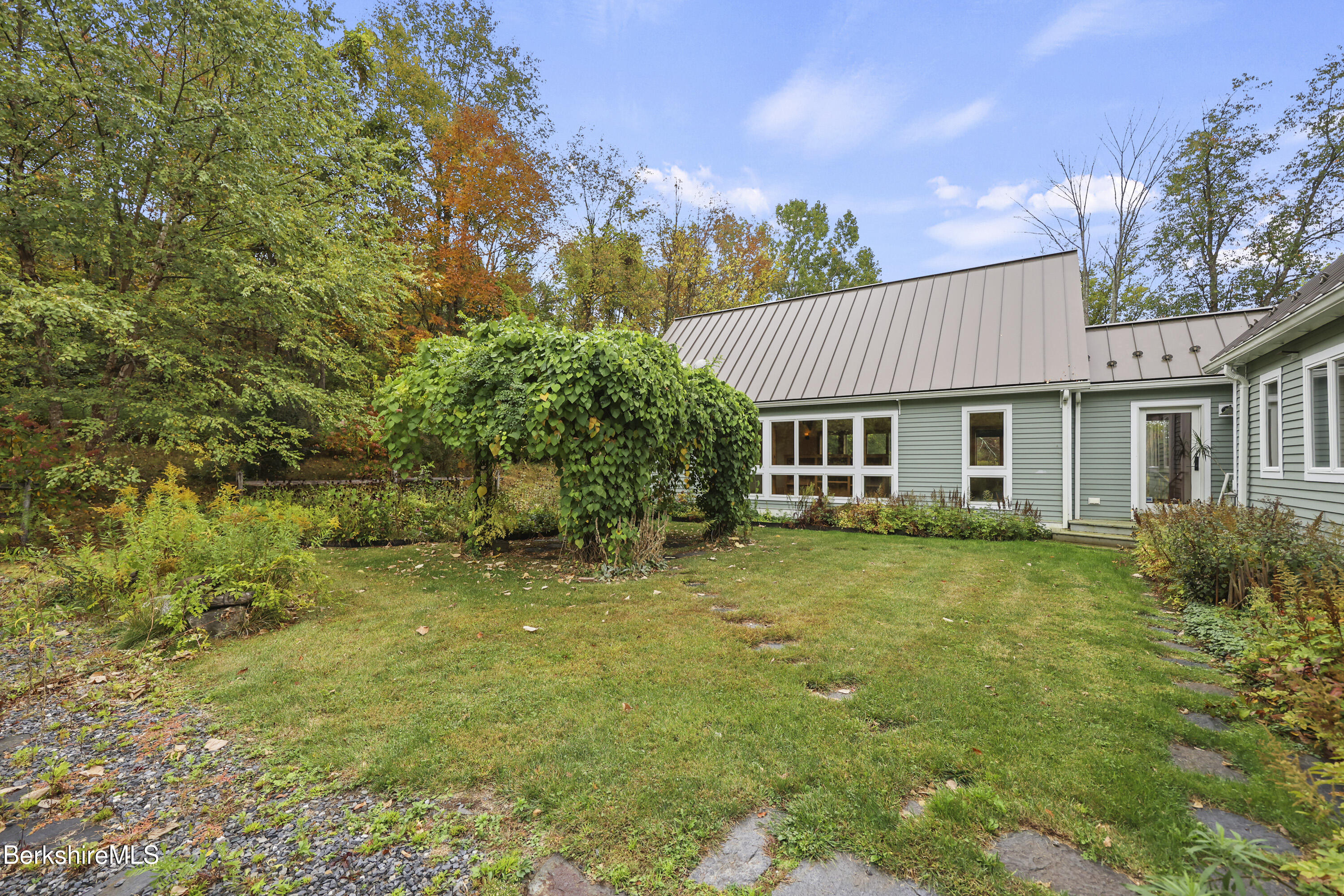 1030 Simonds Road Williamstown, MA 01267 - Photo 65 of 76 a front view of a house with a garden