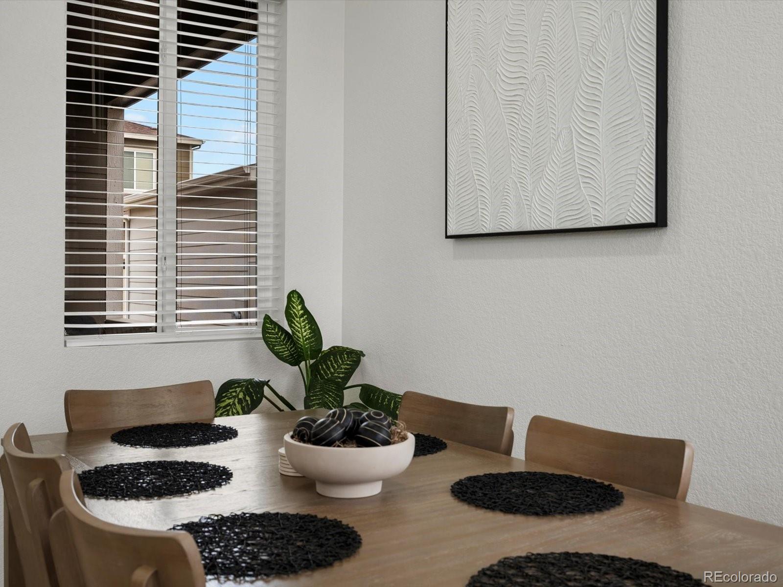 5347 Warrior Street Frederick, CO 80504 - Photo 19 of 48 a close view of a sink and a potted plant on a table