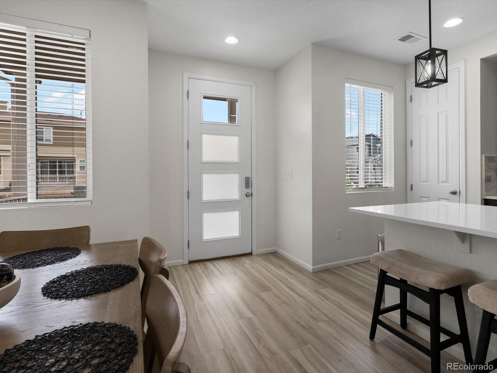 5347 Warrior Street Frederick, CO 80504 - Photo 7 of 48 a bedroom with furniture and a window