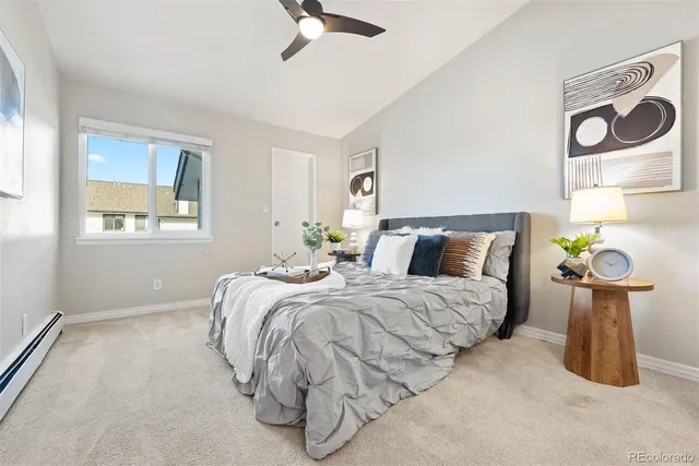 a bedroom with bed and window