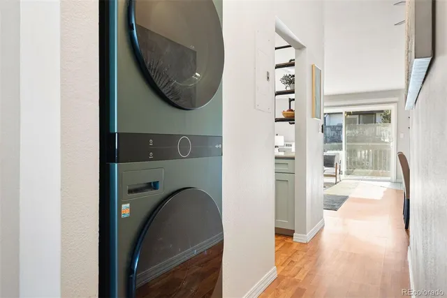 a view of a balcony with wooden fence