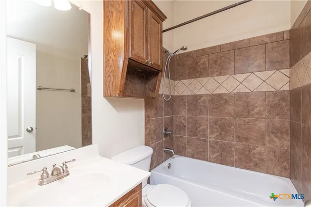 a bathroom with a sink and a bathtub