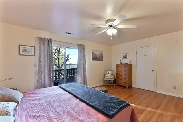 a view of a balcony with lake view and mountain view