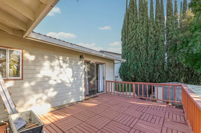 a bedroom with a bed and a mirror