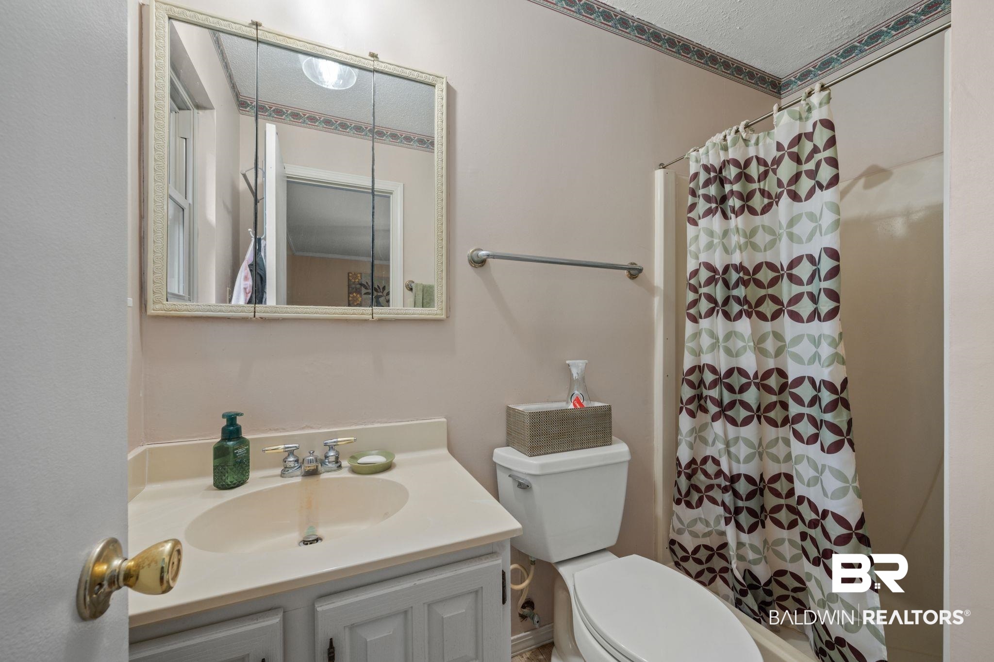 4566 McCrary Road, Unit A Semmes, AL 36575 - Photo 18 of 28 Bathroom featuring walk in shower, toilet, a textured ceiling, and vanity