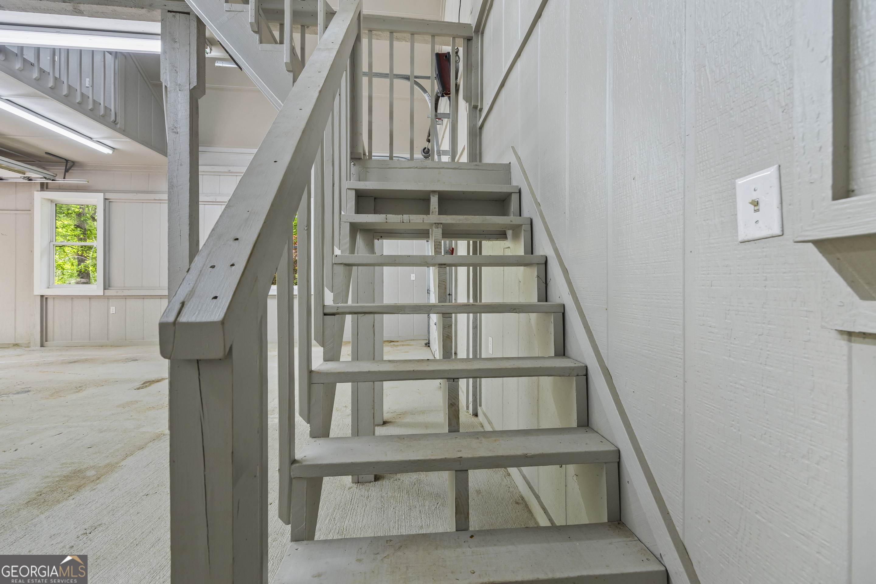 339 Ben Loudermilk Road Mount Airy, GA 30563 - Photo 13 of 49 a view of staircase with large window