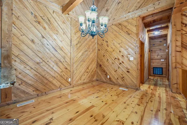 a view of a house with a snow in the yard