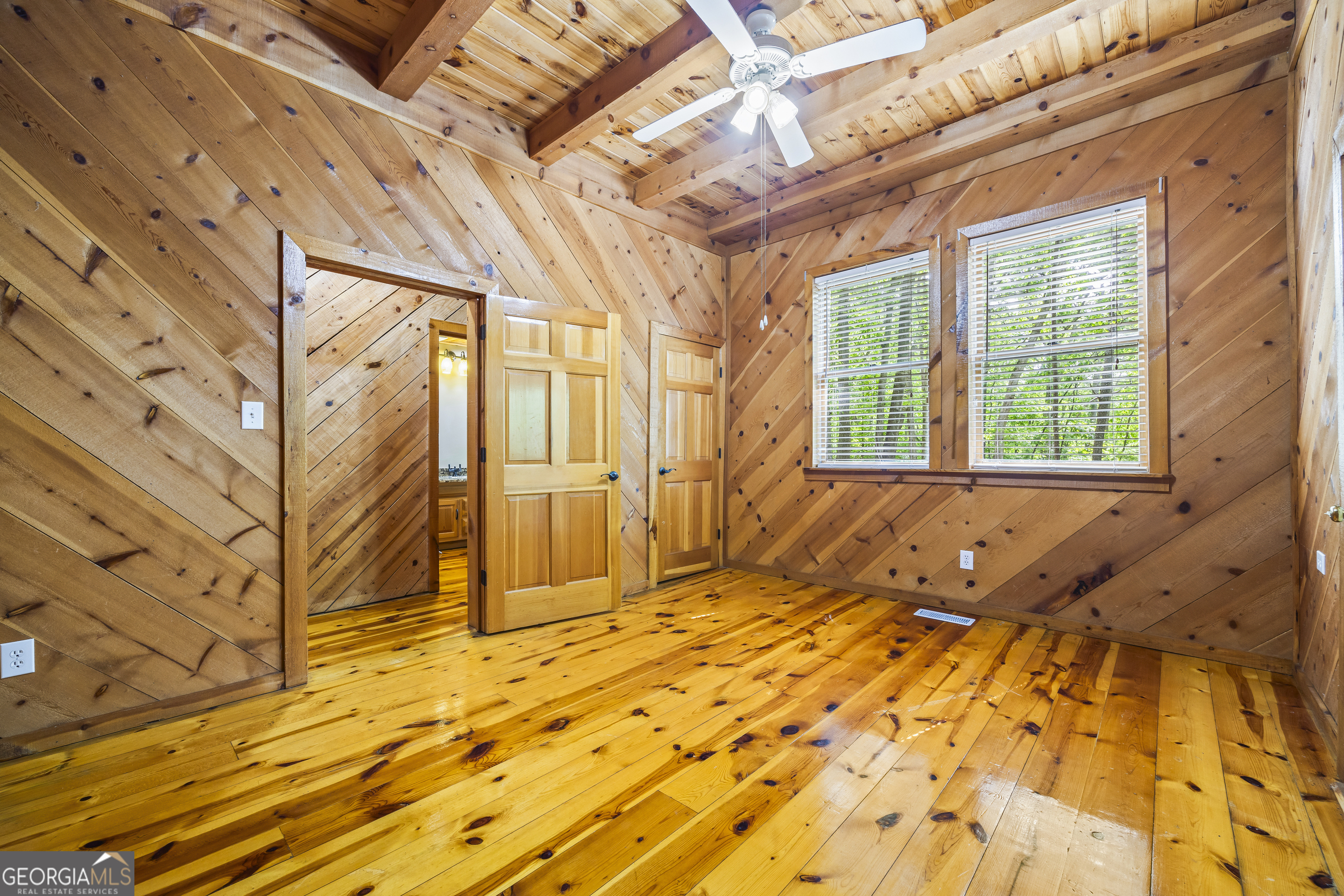 339 Ben Loudermilk Road Mount Airy, GA 30563 - Photo 29 of 49 a spacious bathroom with a bathtub and shower