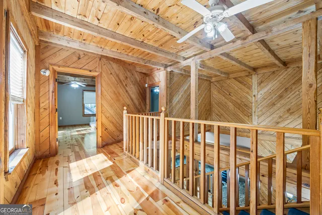 a bathroom with a toilet and a tub