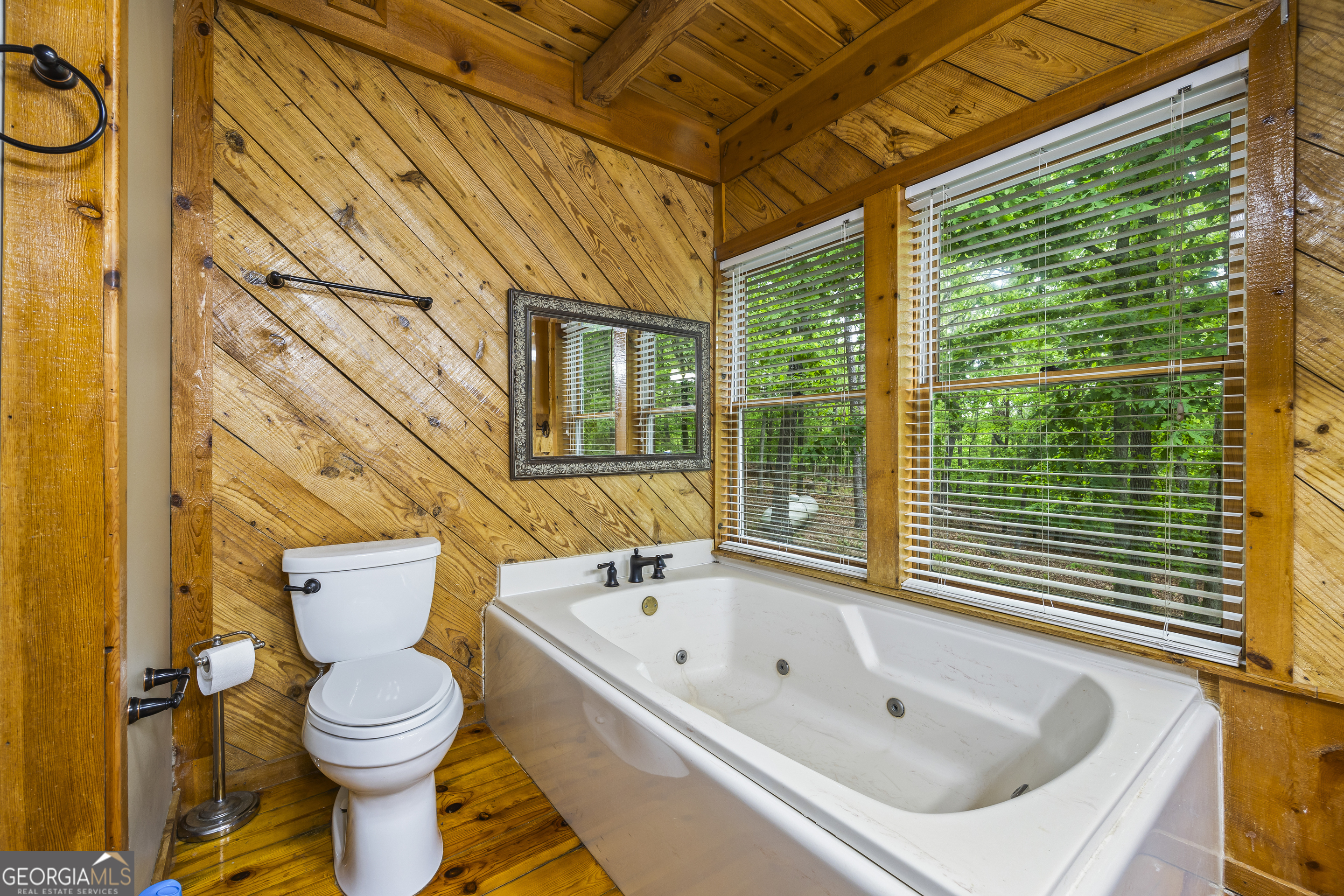 339 Ben Loudermilk Road Mount Airy, GA 30563 - Photo 38 of 49 a bathroom with a toilet and a tub
