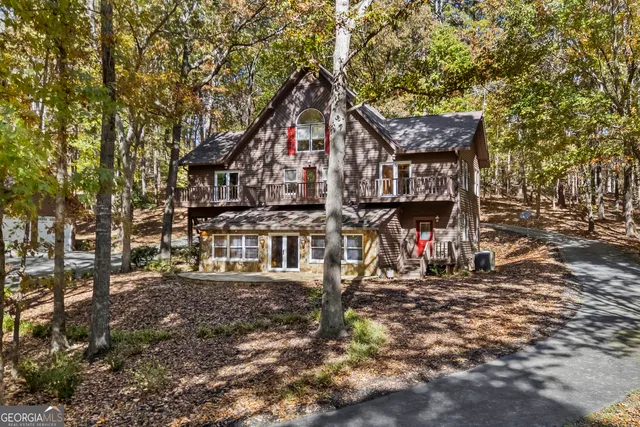 a backyard of a house with barbeque oven