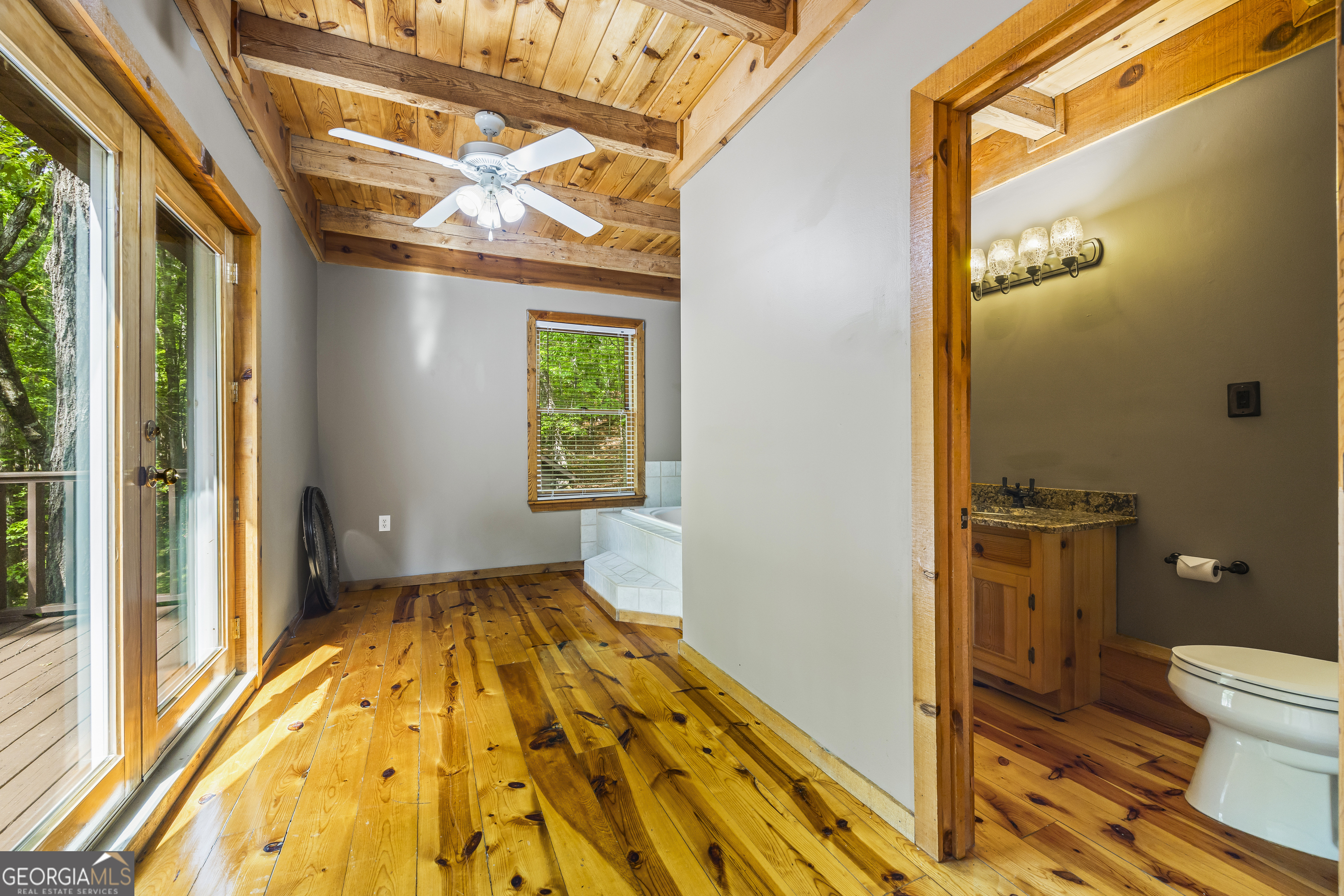 339 Ben Loudermilk Road Mount Airy, GA 30563 - Photo 44 of 49 a bathroom with a sink and a toilet