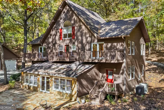 a view of house with a outdoor space