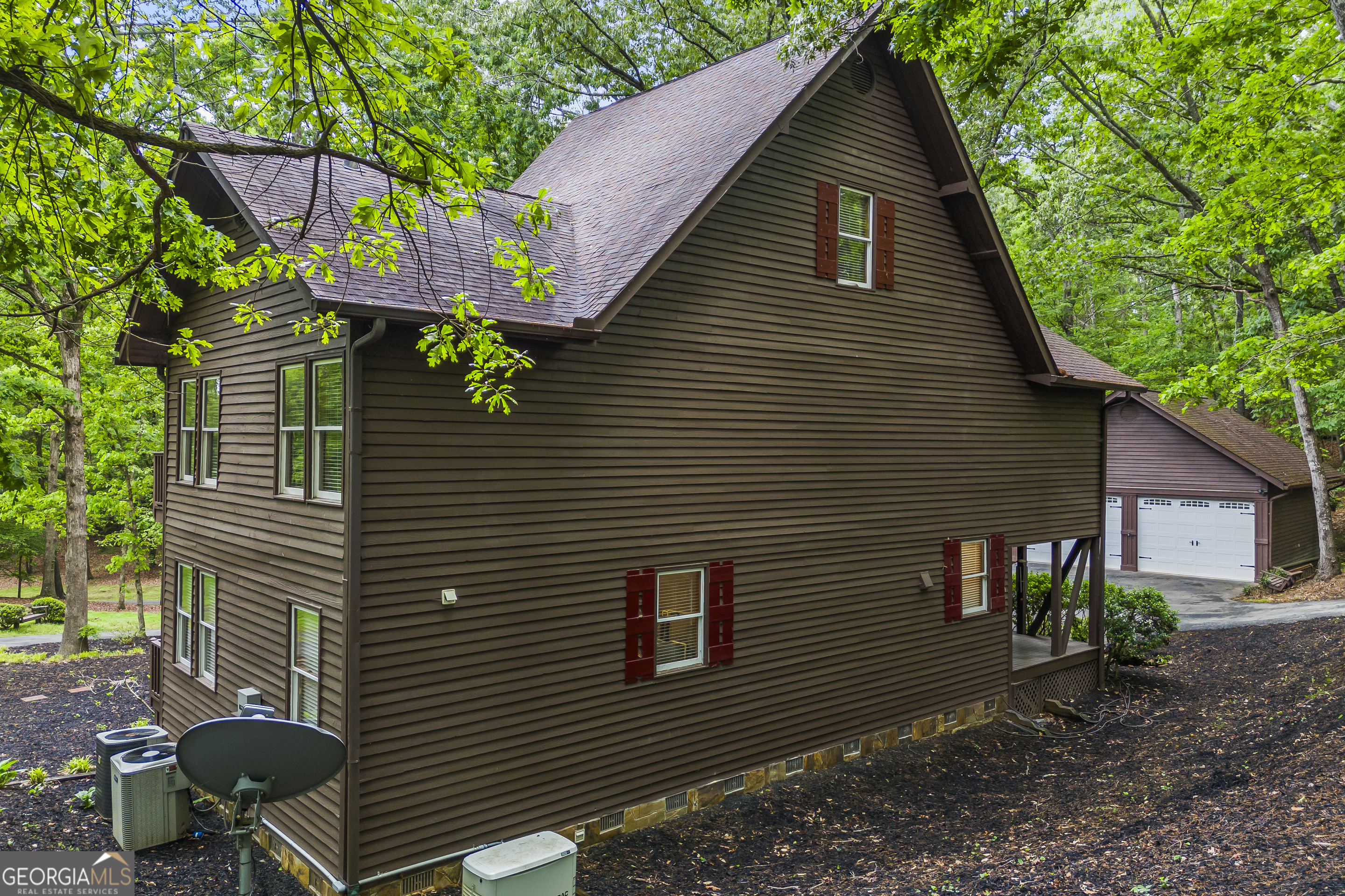 339 Ben Loudermilk Road Mount Airy, GA 30563 - Photo 7 of 49 a backyard of a house with lots of green space
