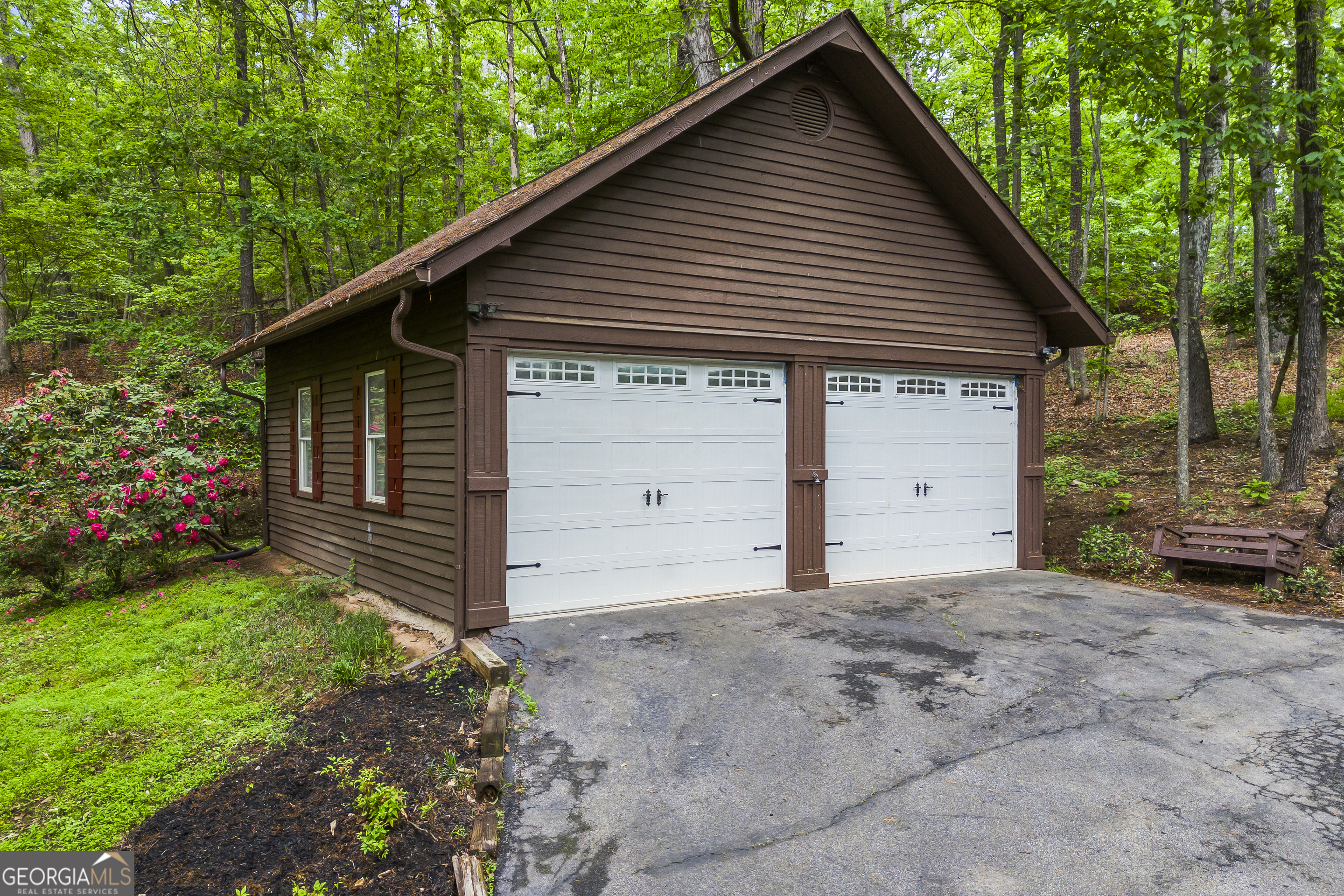 339 Ben Loudermilk Road Mount Airy, GA 30563 - Photo 10 of 49 a view of a house with a yard plants and large tree