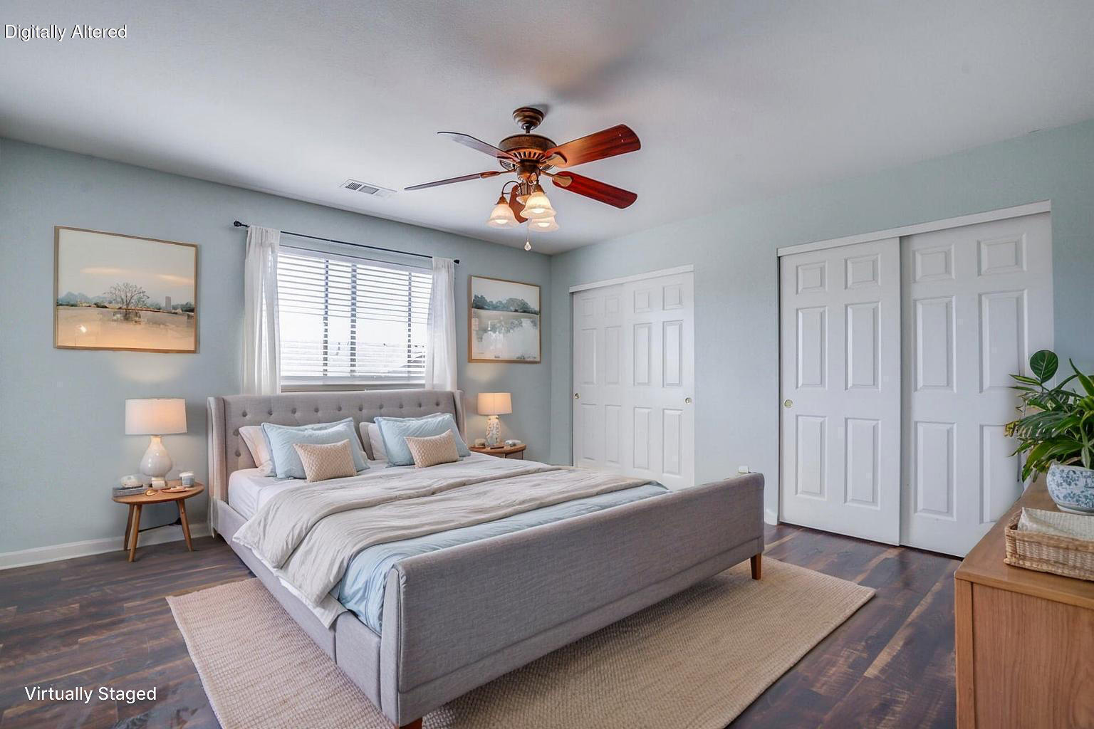 11326 Puffin Way Redding, CA 96003 - Photo 17 of 34 a bedroom with a bed and a chandelier