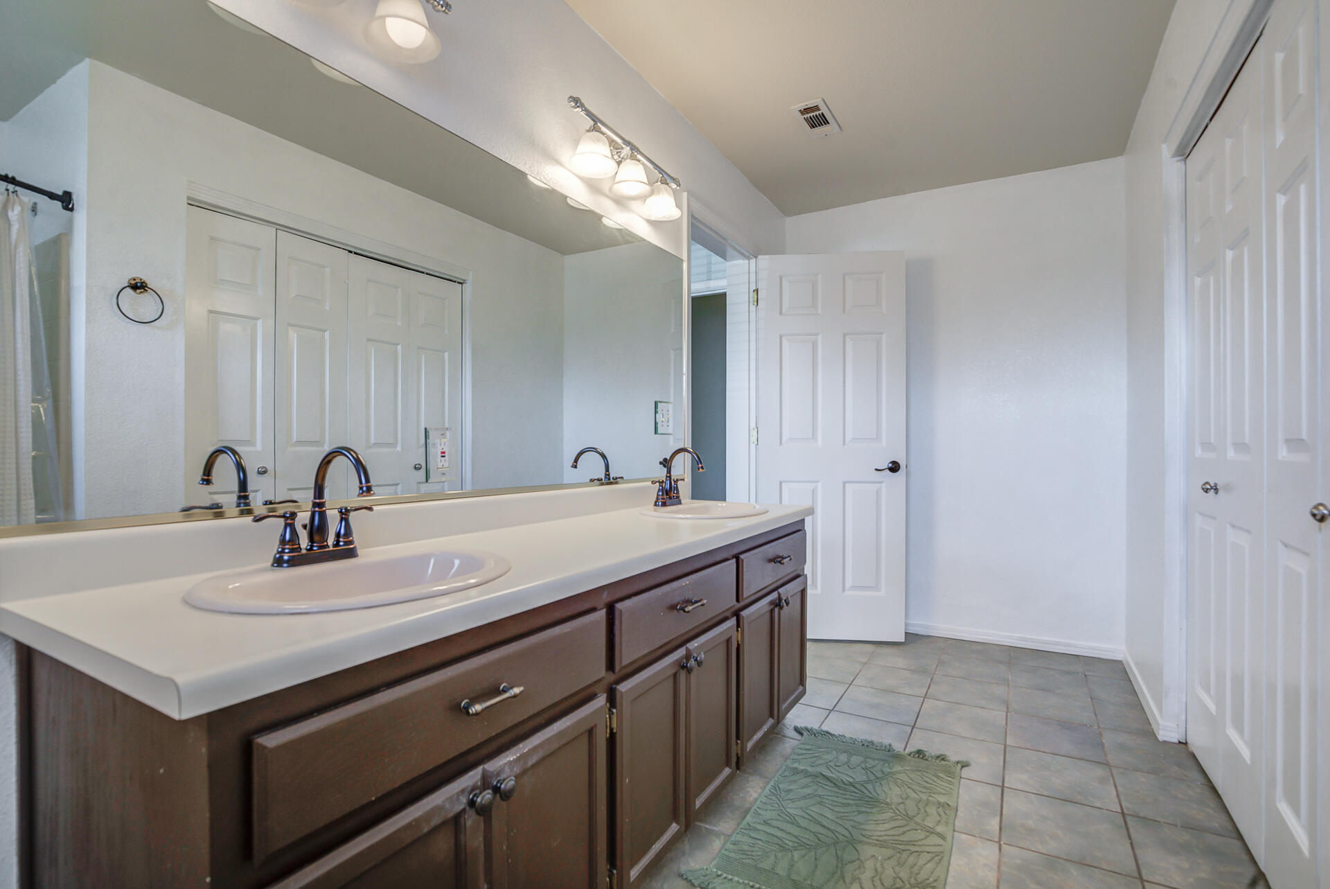 11326 Puffin Way Redding, CA 96003 - Photo 21 of 34 a bathroom with a sink and a mirror