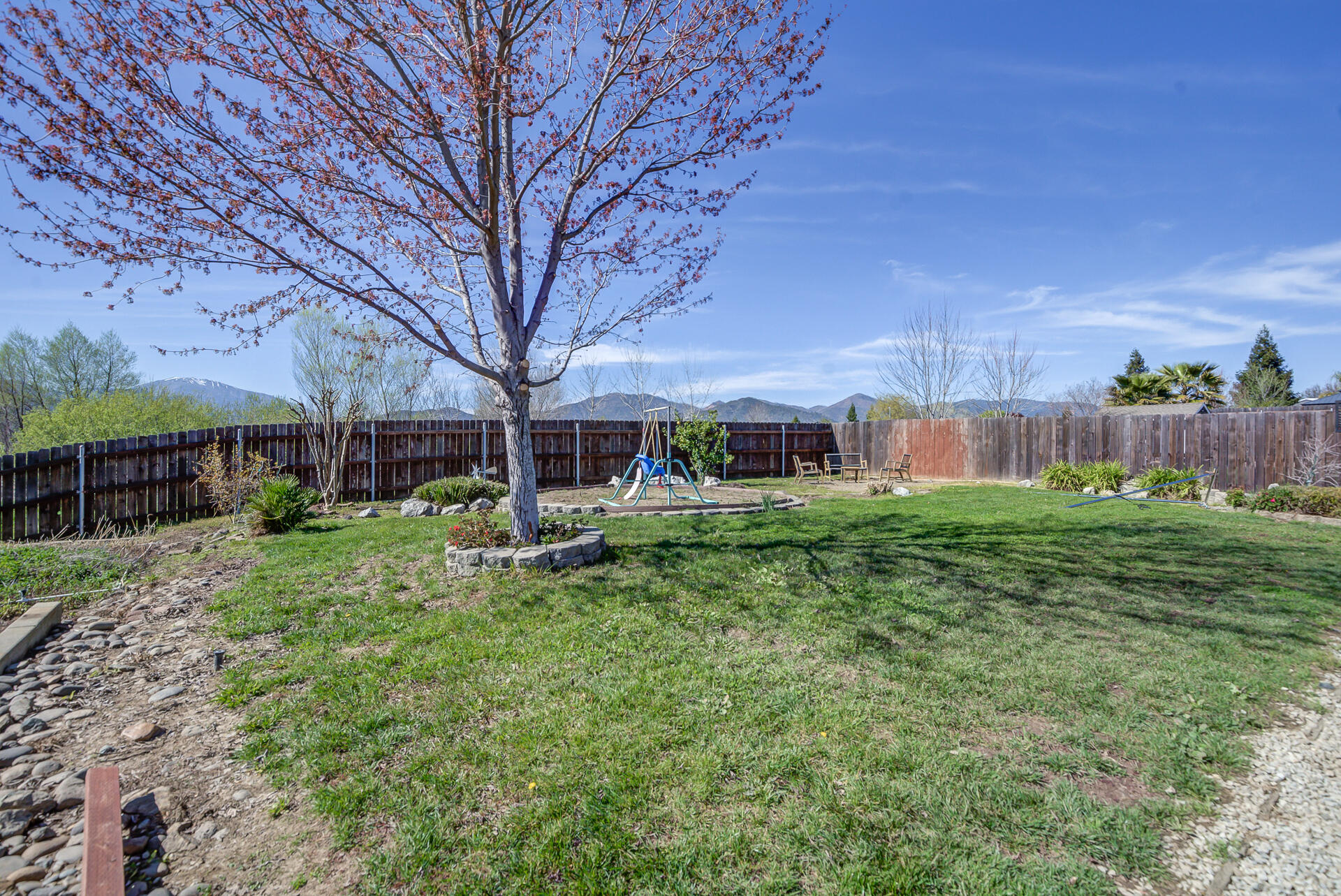 11326 Puffin Way Redding, CA 96003 - Photo 26 of 34 a front view of a house with garden