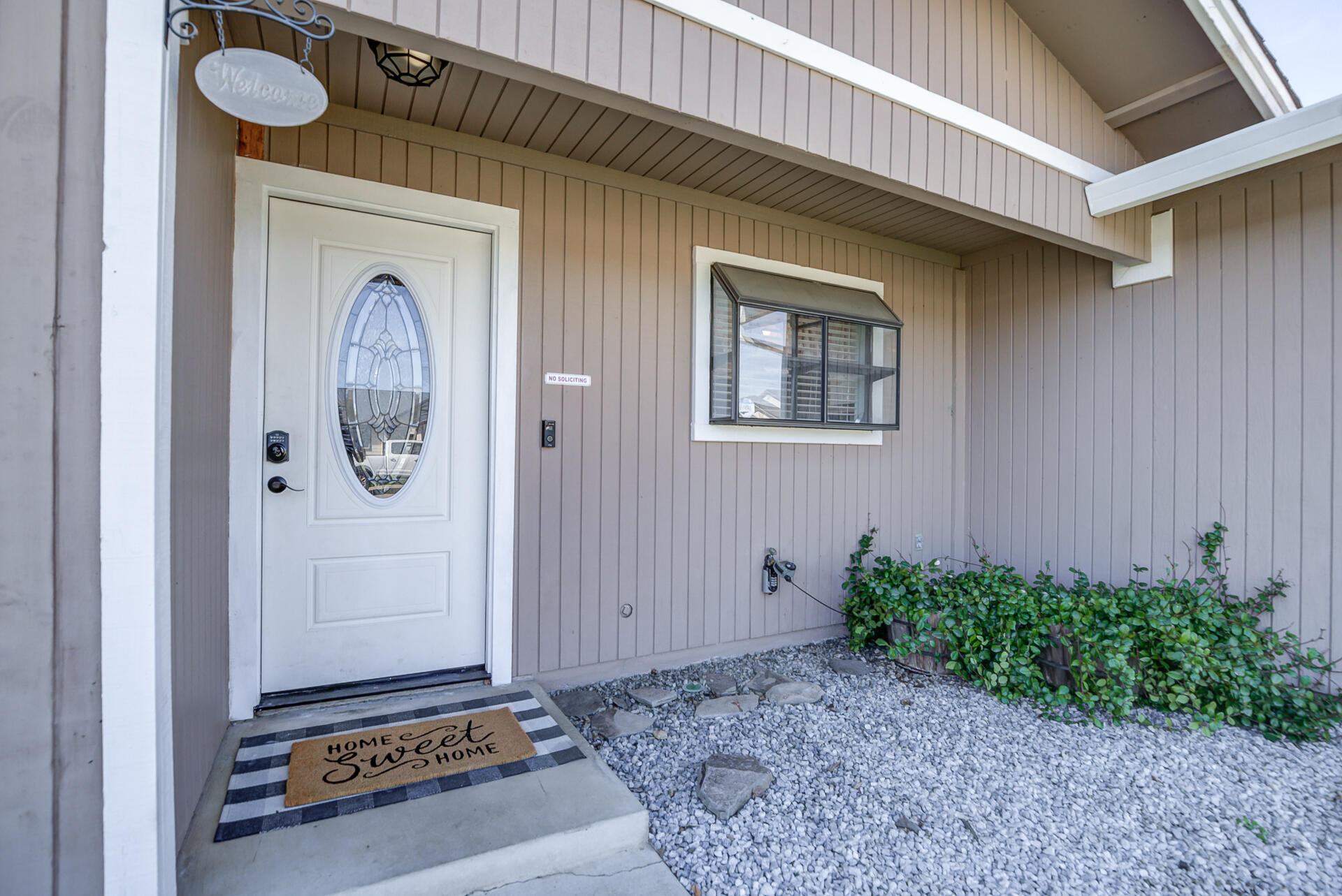 11326 Puffin Way Redding, CA 96003 - Photo 3 of 34 a front view of a house with garden