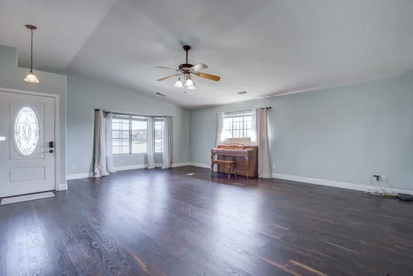 a kitchen with stainless steel appliances a refrigerator sink and stove