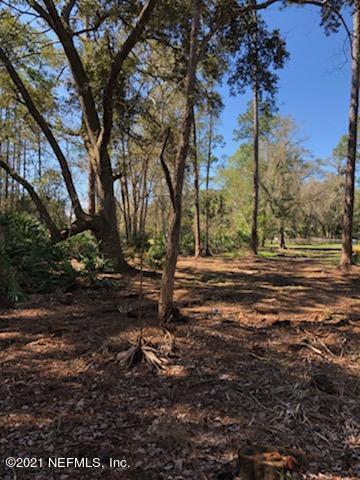 2850 Hilltop Road St. Augustine, FL 32086 - Photo 11 of 11 a view of dirt yard with a tree