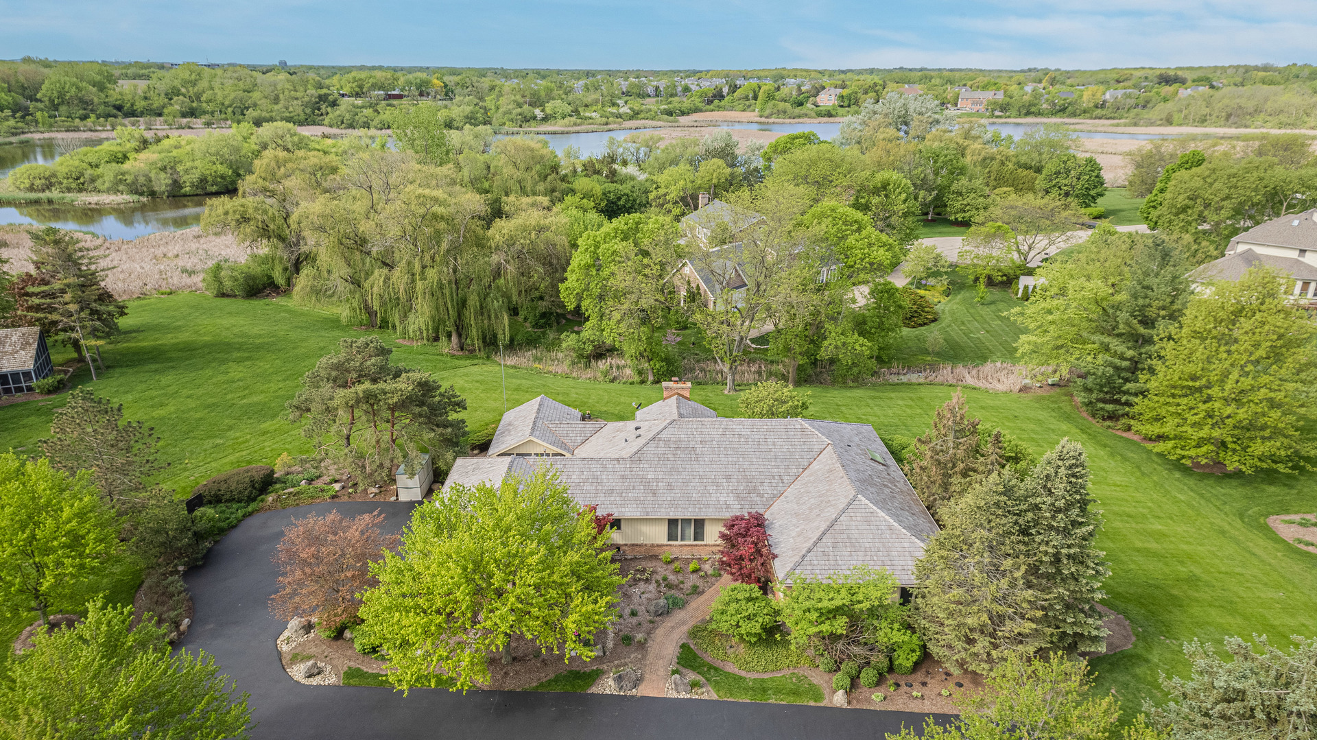 2220 Applecross Road Inverness, IL 60010 - Photo 33 of 36 an aerial view of a house with a yard