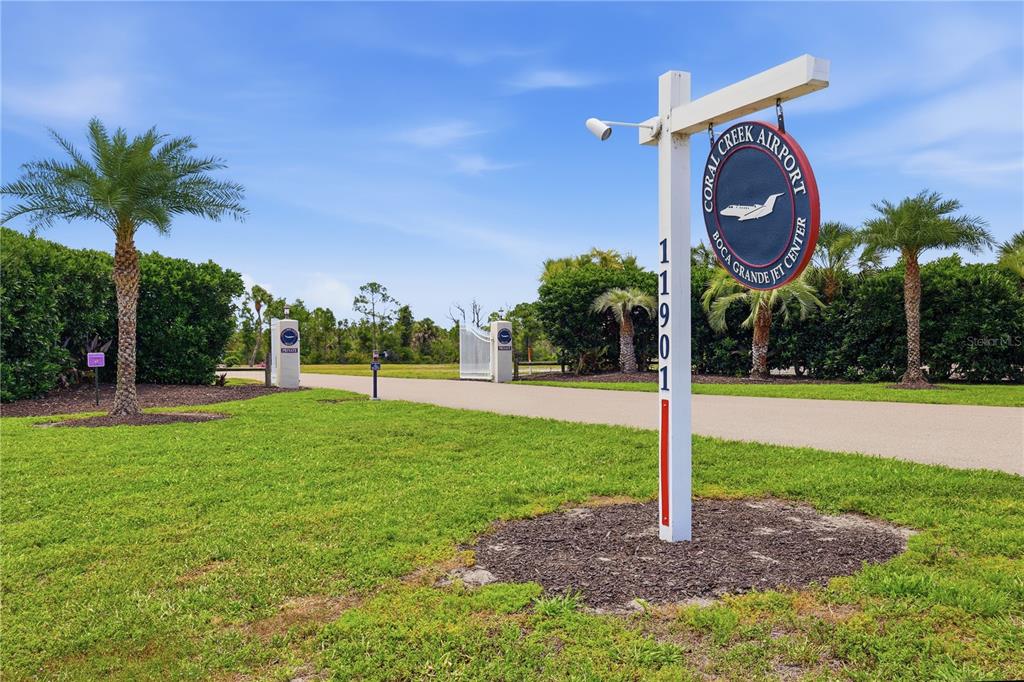 11610 Bridle Path Lane Placida, FL 33946 - Photo 16 of 18 a view of a park with welcome board