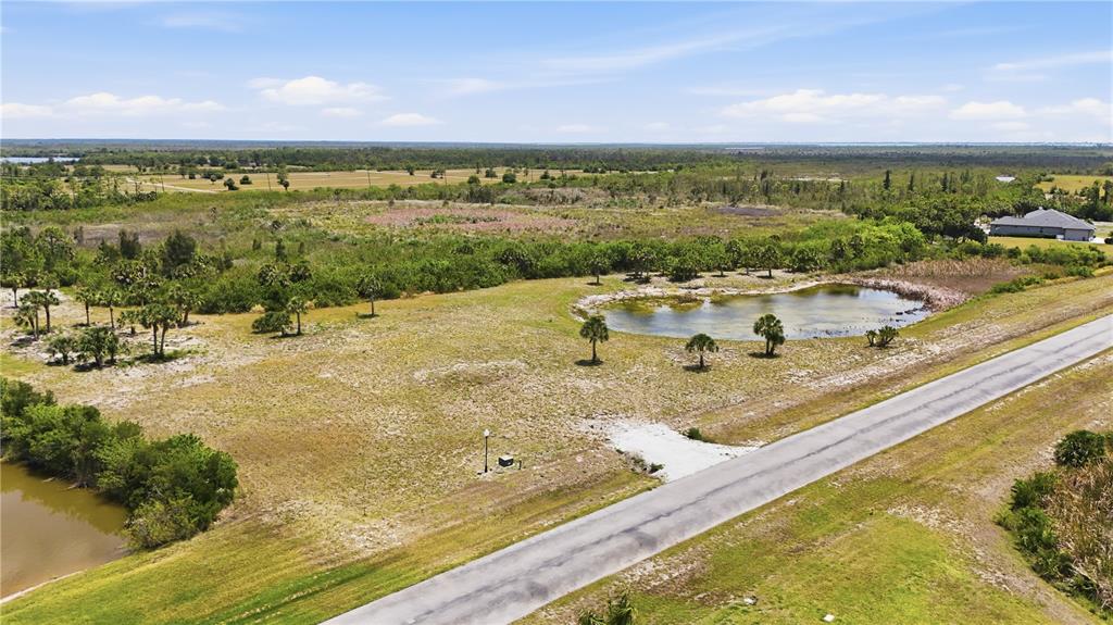 11610 Bridle Path Lane Placida, FL 33946 - Photo 2 of 18 a view of a swimming pool and an ocean